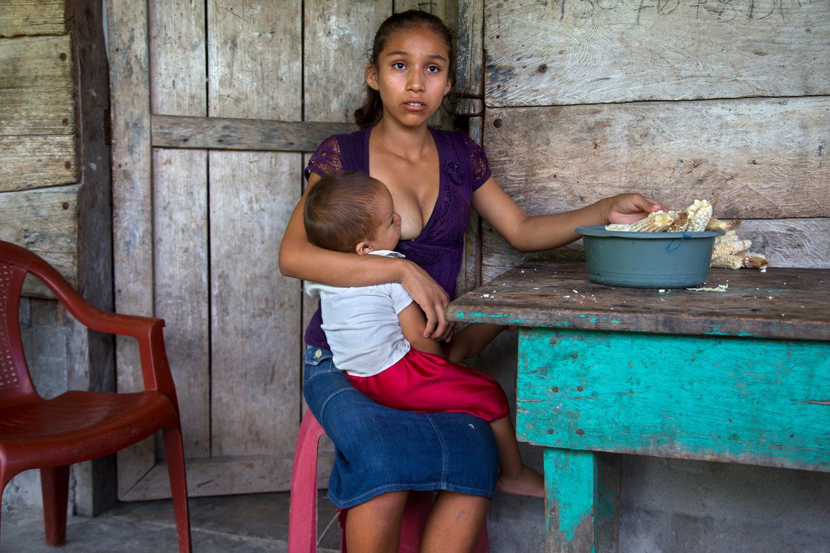 Aracely, 15, of Guatemala holds her infant. "What I hope is to keep moving forward ... to see how I can get my boy ahead. The hard thing, maybe ... when he gets older and he leaves ... that's when is going to be hard for me. When he is older. Because he is the one who will help me get ahead." Aracely is one of the half a million of Guatemalan girls who marry and give birth before they can legally vote, drink or buy cigarettes. <br><br>