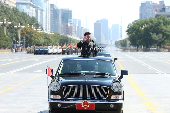 Xi Jinping inspects troops during a military parade in Beijing.