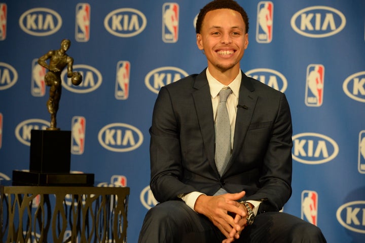 Curry with his 2014-2015 MVP trophy.