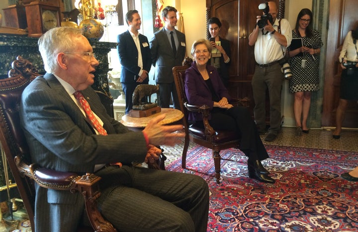Senate Minority Leader Harry Reid (D-Nev.) and Sen. Elizabeth Warren (D-Mass.) spoke with progressive groups in the Capitol o