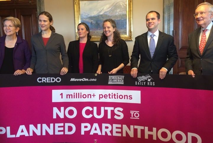 Sen. Elizabeth Warren (D-Mass.), Anna Galland (MoveOn.org), Rachel Colyer (Daily Kos), Heidi Hess (CREDO Action), Neil Sroka