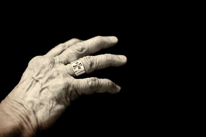 A photo of the author. "The combination of the cross and her hand just spoke volumes to me about her wisdom and faith," said photographer Courtney Perry.