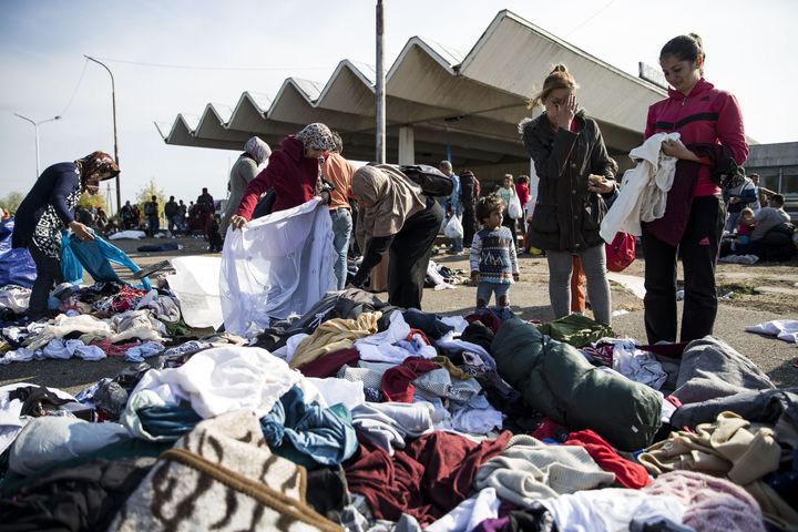 Refugees receive clothes and shoes in Hegyeshalom, Hungary on September 23, 2015.