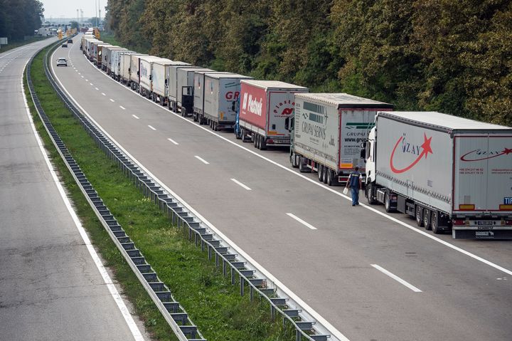 Truck drivers wait on a highway to cross the Serbian-Croatian border in Batrovci, Serbia, on Sept. 24, 2015. Croatia barred all Serbian-registered vehicles from crossing from Serbia on Thursday, demanding that Serbia send some migrants to Hungary or Romania instead.