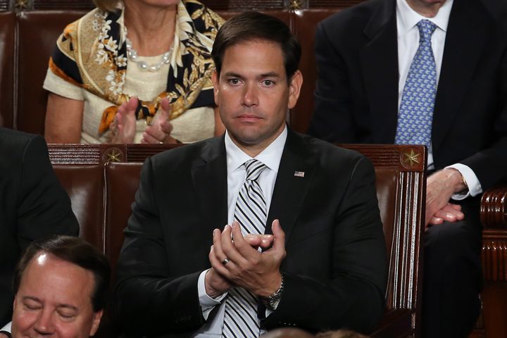 Republican presidential candidate Marco Rubio applauds as Pope Francis addresses a joint meeting of Congress on Sept. 24, 2015.