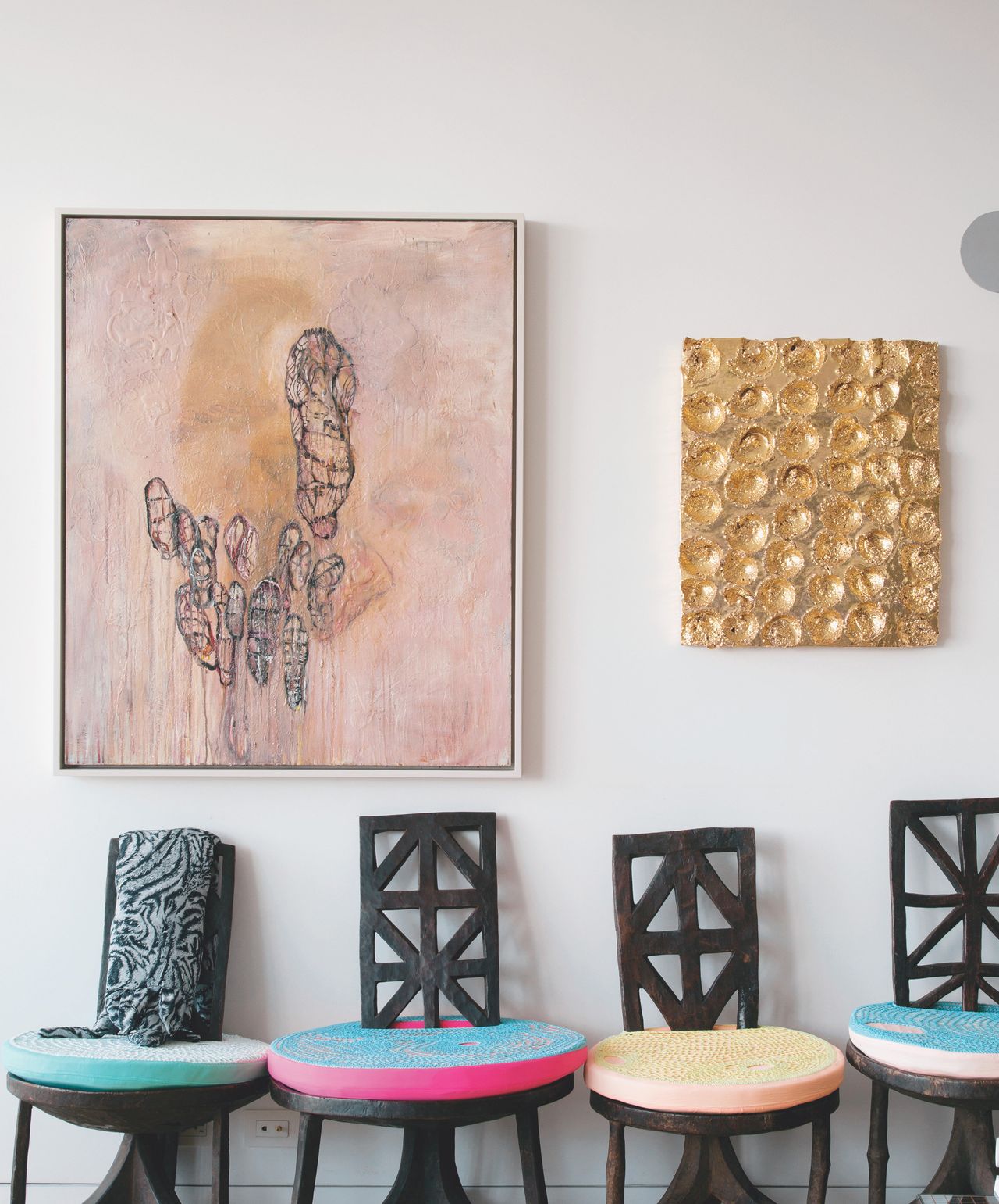 The home of Cindy Sherman: Besty Berne's 1996 painting "Dong Song" next to Otto Piene's 2011 glazed clay piece "The Golden Idaho." Berne, a longtime friend of Sherman's, is now primarily a writer. Sherman bought the Piene at a benefit auction.