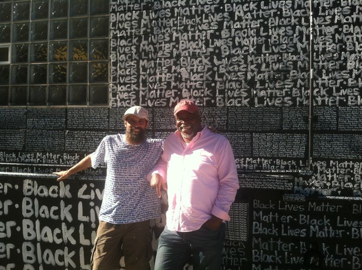 Renda Writer and George N'namdi in front of the Black Lives Matter mural in Detroit.