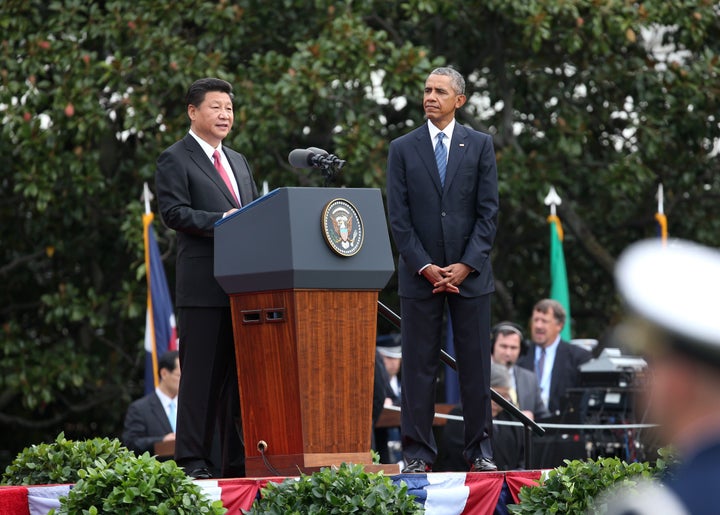 WASHINGTON D.C., Sept. 25, 2015-- Chinese President Xi Jinping, left, addresses a welcome ceremony held by U.S. President Barack Obama at the South Lawn of the White House in Washington D.C., the United States, Sept. 25, 2015. Xi arrived in Washington, the second stop of his state visit to the United States, on Thursday after a busy two-and-a-half-day stay in Seattle. (Xinhua/Pang Xinglei via Getty Images)