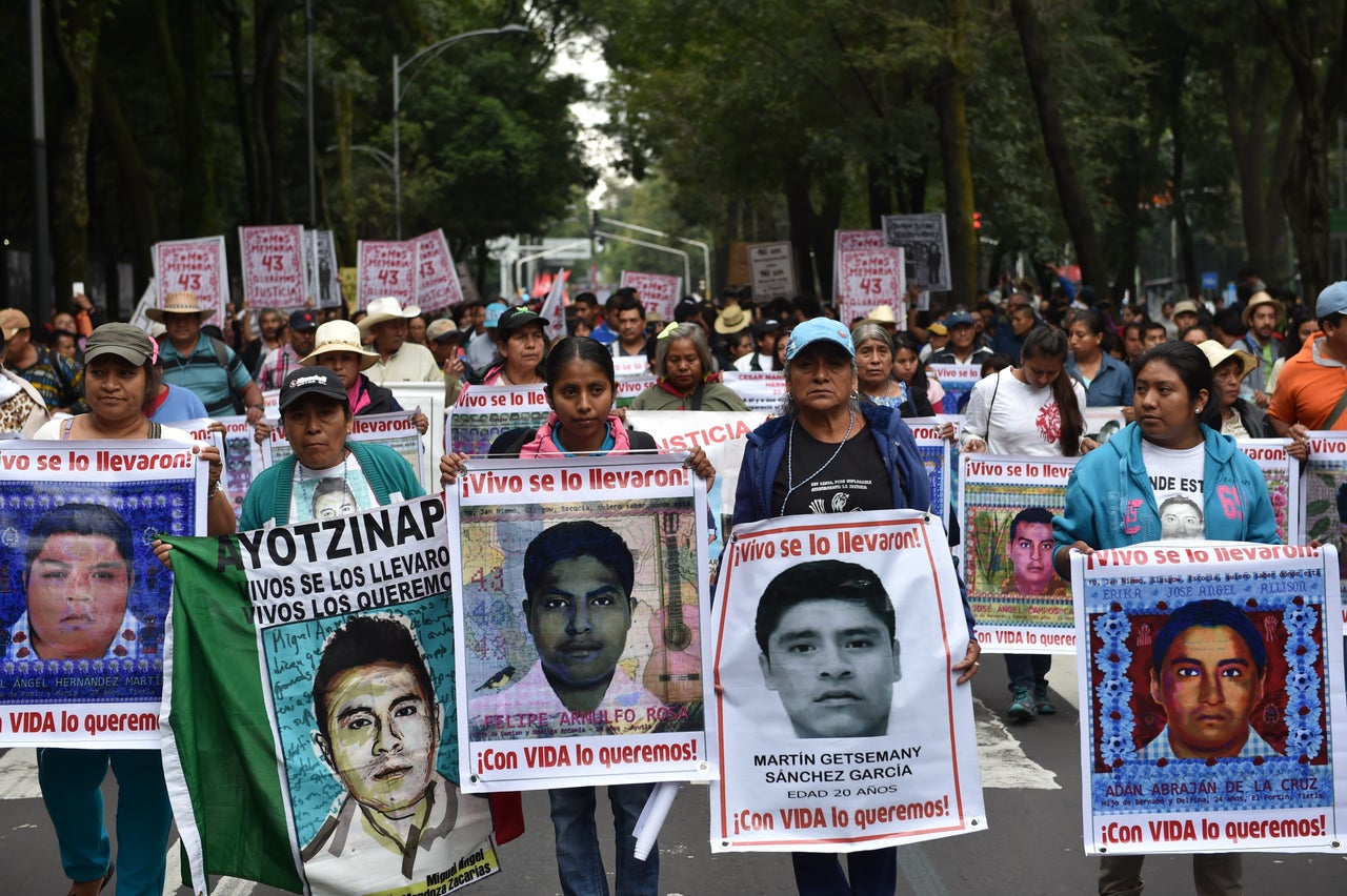 Relatives and supporters of the missing 43 students march through Mexico City Sept. 26, 2015. The students, from a rural teachers college in the southern state of Guerrero, disappeared after they were attacked by local police in the city of Iguala on Sept. 26, 2014.