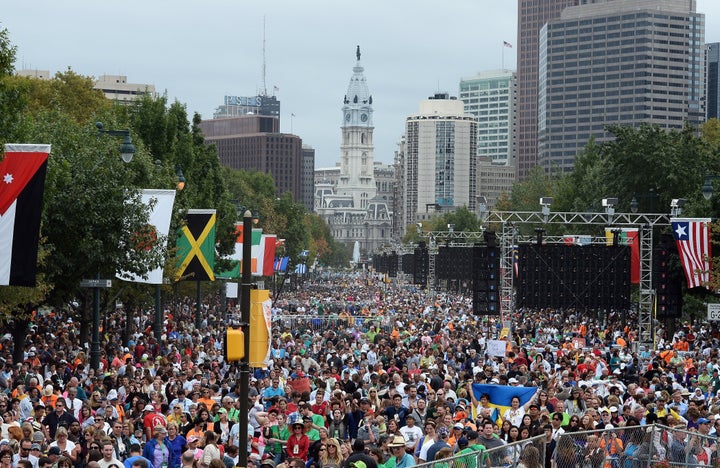 Faithful gather for an open-air Mass lead by Pope Francis at the Benjamin Franklin Parkway in Philadelphia on Sept. 27, 2015.