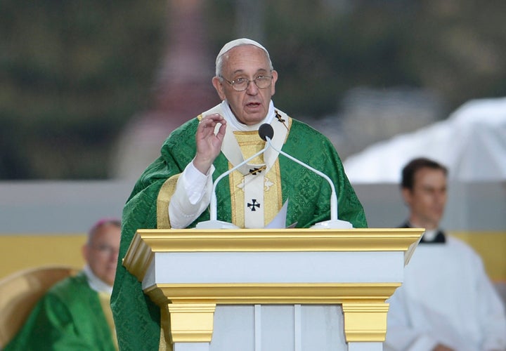 Pope Francis delivers the homily as he celebrates mass at the World Meeting of Families at Benjamin Franklin Parkway iSeptember 27, 2015 n Philadelphia, Pennsylvania. 