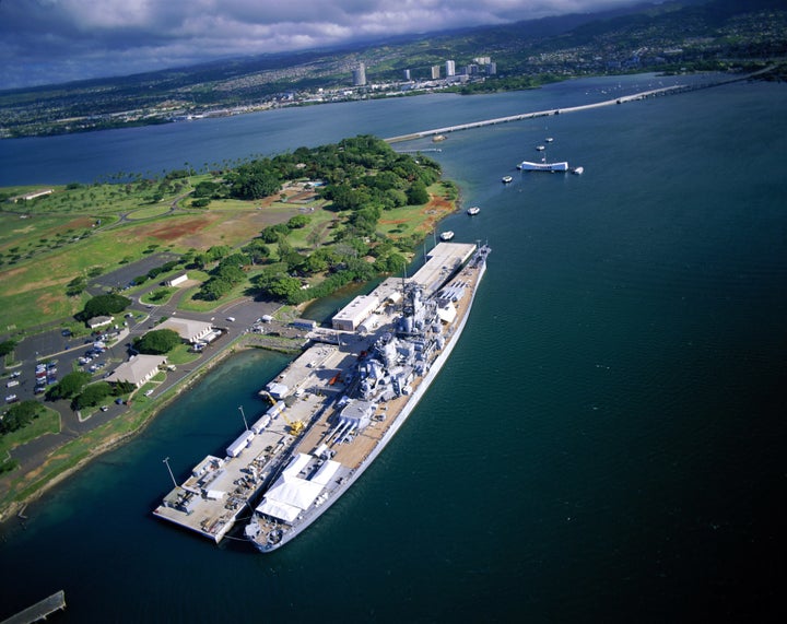 Pearl Harbor: USS Missouri foreground, USS Arizona Memorial background.