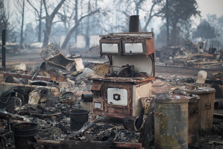 A wood burning stove stands in the ruins of a home that burned in the Valley Fire in Middletown, California, on Sept. 15, 2015 .