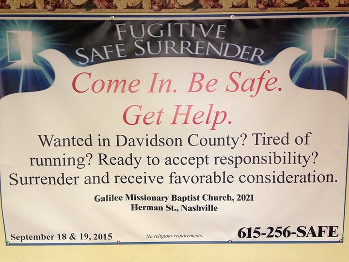 A sign in the Galilee Missionary Baptist Church fellowship hall, converted to a Fugitive Safe Surrender waiting area on Sept.