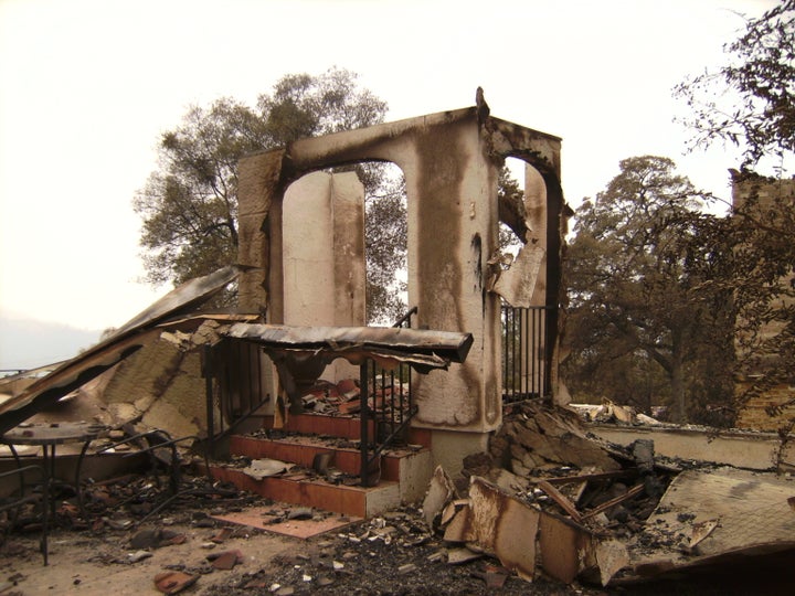 The remains of steps at Kim Dougherty's home after it burned to the ground at the Butte Fire in Calaveras County, California, on Sept. 9, 2015.