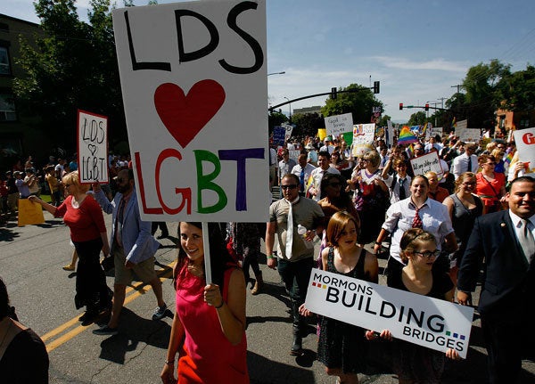 Mormons Building Bridges group leads the annual Gay Pride Parade through downtown Salt Lake City, Sunday, June 3, 2012. 