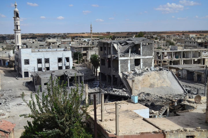 Buildings are damaged and streets are deserted in the town of Talbisseh in Homs province, Syria, on Sept. 30, 2015. On Wednesday, Russia said it launched air strikes against the Islamic State in Syria, after giving Washington just one hour's notice.