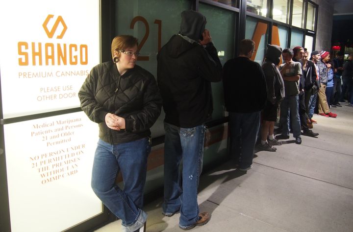 Davia Fleming waits outside Shango dispensary in Portland, where she'll be one of Oregon's first legal marijuana customers.