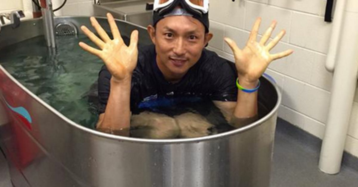 TORONTO, ON- JUNE 22 - Munenori Kawasaki adjusts his helmet as the News  Photo - Getty Images