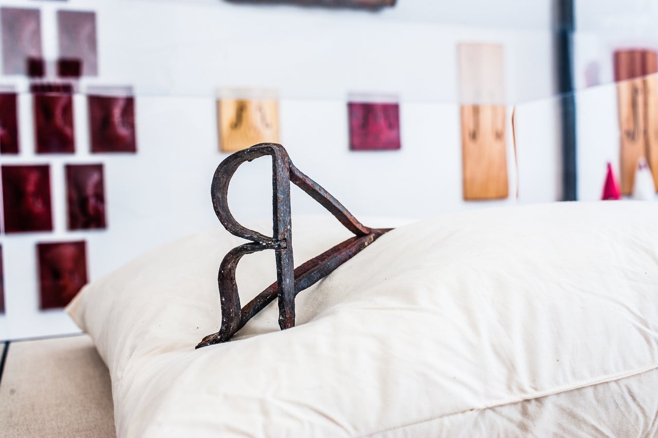 <strong>"When Black Lives Mattered," 2015: </strong>An 18th Century branding iron used on runaway slaves.100% cotton pillow with down fill.
