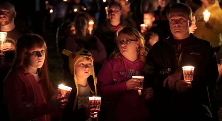 People gather at a vigil in Roseburg, Oregon, after the Oct. 1 shooting at Umpqua Community College.