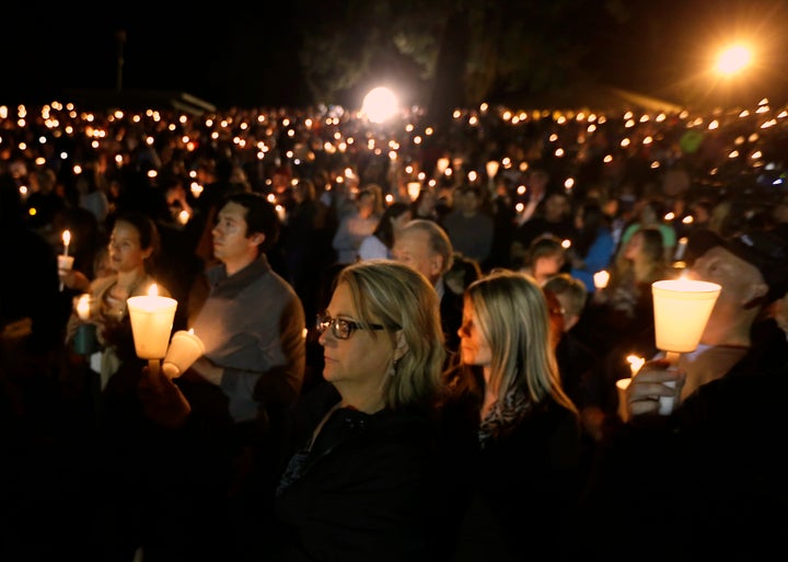 Community members gather for a vigil for those killed in a shooting at Umpqua Community College in Roseburg, Oregon on Oct. 1, 2015.