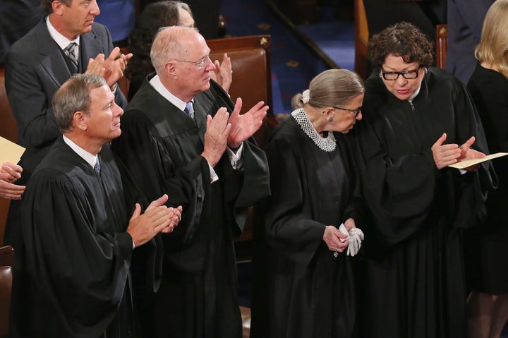 From left: U.S. Supreme Court Chief Justice John Roberts and Associate Justices Anthony Kennedy, Ruth Bader Ginsburg and Sonia Sotomayor applaud at the conclusion of Pope Francis' address to a joint meeting of Congress in the House chamber of the U.S. Capitol in late September. The court begins its new term Monday.