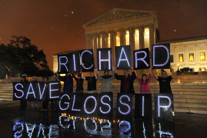 Anti-death penalty activists rally outside the Supreme Court on Sept. 29, 2015, in a final attempt to prevent the execution o