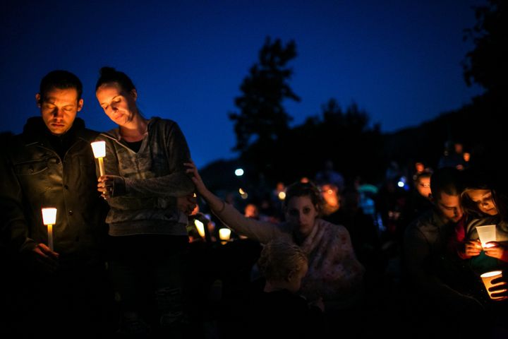 Community members attend a prayer service and candlelight vigil to remember the victims of the mass shooting at Umpqua Community College.