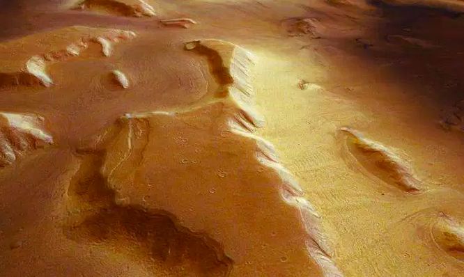 Using radar, scientists discovered ice under these thick layers of Martian dust.