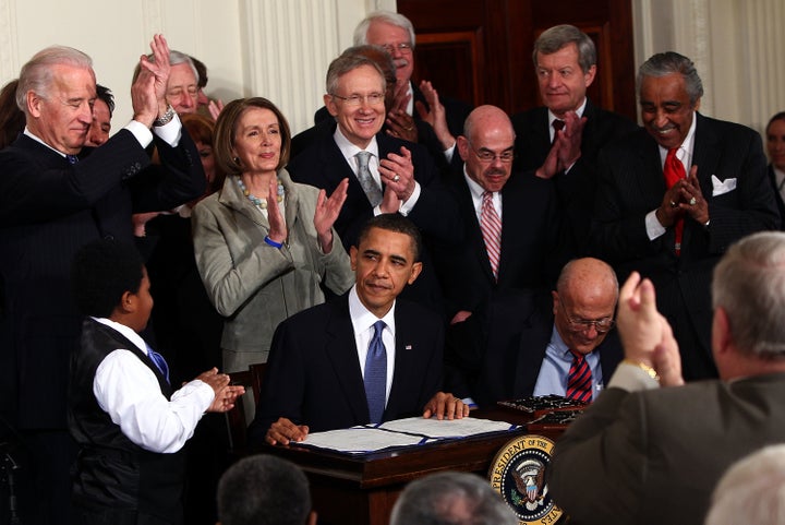 President Barack Obama signs the Affordable Care Act into law on March 23, 2010. He didn't pose for the media when he put his signature on this new health care bill.