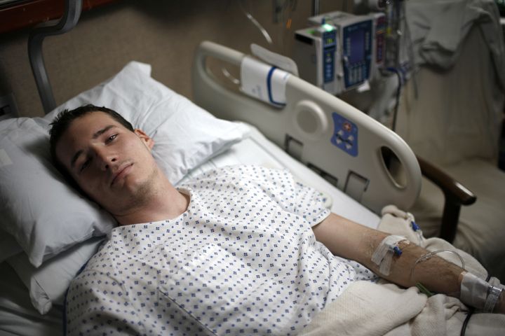 Colin Goddard, who was shot four times in the Virginia Tech massacre, lies in the hospital.