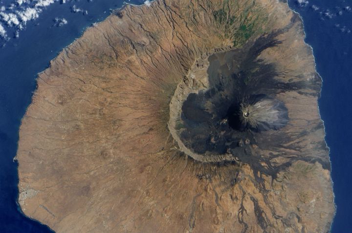 Scientists think that the volcano Fogo’s eastern slope crashed into the sea, leaving behind the giant scar pictured here and triggering a mega-tsunami.