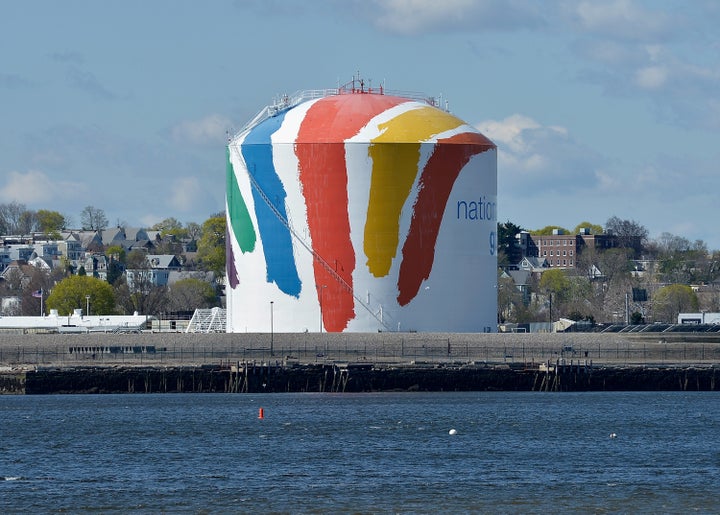 A general view of "Rainbow Swash" by artist Corita Kent, painted in 1971 on a 140-foot tall LNG storage tank in Boston. It is