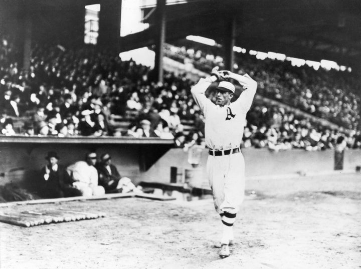 Eddie Plank, starting pitcher for Philadelphia, warms up in Shibe Park before Game Two of the 1914 World Series.