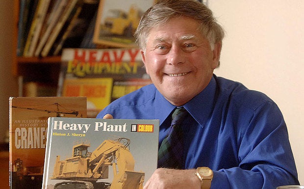 Author Hinton Sheryn, shown here displaying one of his books, was convicted of 18 sex crimes and sentenced to 17 years in pri