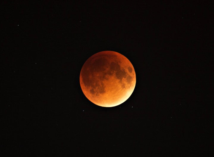 A blood and supermoon is seen across Canada with clear skies in Montreal, Canada on the night of Sept. 27, 2015.
