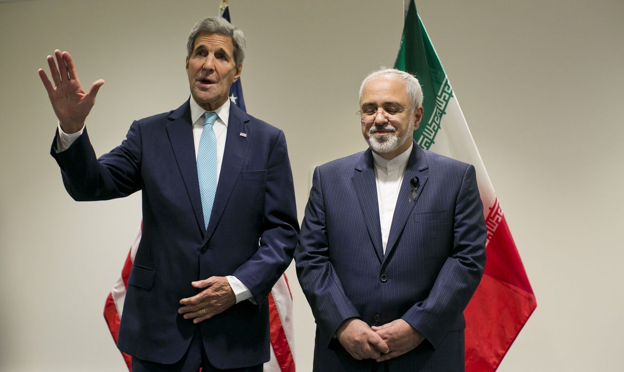 U.S. Secretary of State John Kerry (left) poses with Iranian Foreign Affairs Minister Mohammad Javad Zarif at the United Nations on Sept. 26, 2015.