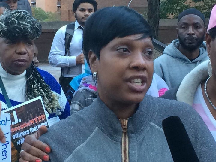 Constance Malcolm, the mother of Ramarley Graham, speaks at Tuesday's rally as Gwen Carr, mother of Eric Garner, looks on. Graham and Garner both died during encounters with NYPD officers.