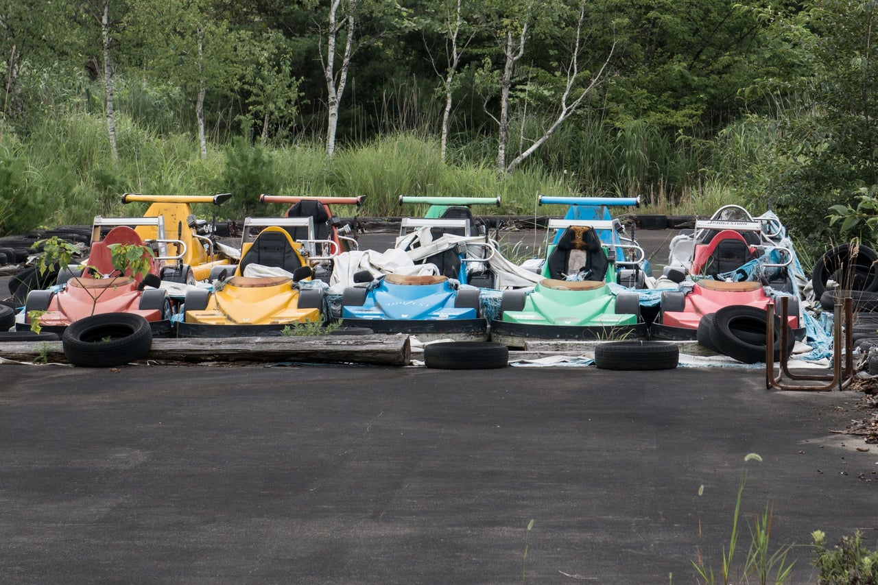 Go karts lined up and ready to race.