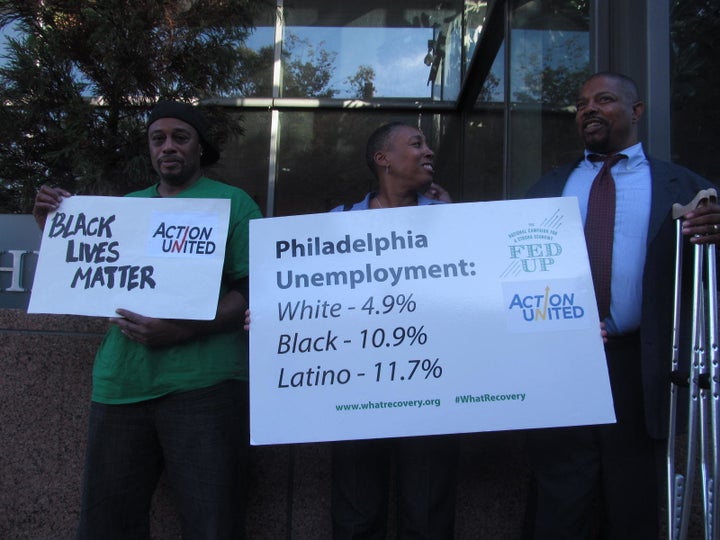 Members of the Philadelphia community group ACTION United protest outside the Federal Reserve Bank of Philadelphia on Tuesday, October 6.