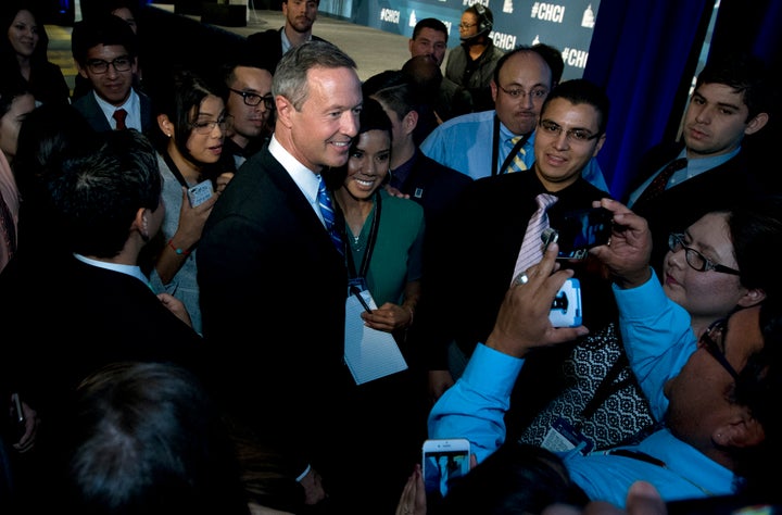 Democratic hopeful and former Maryland Gov. Martin O'Malley shakes hands with participants after speaking at the Co
