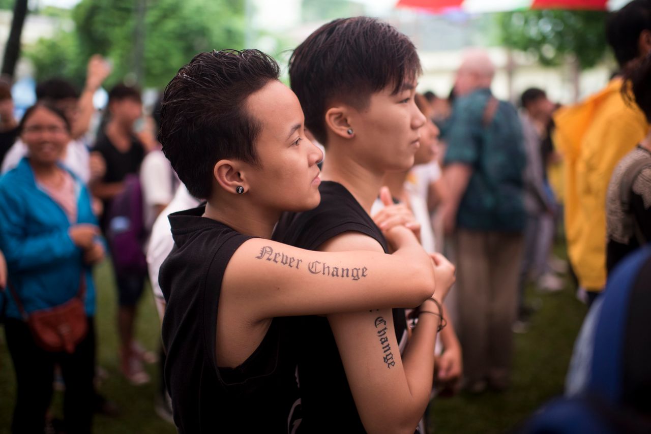 Two Vietnamese women attend the LGBT pride parade on Aug. 2, 2015, in Hanoi, Vietnam.