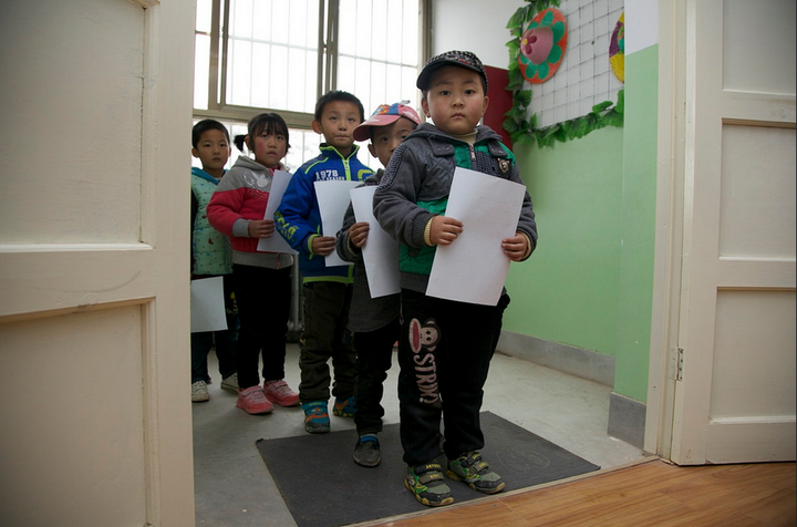 Students line up for a vision screening organized by REAP and CEEE.