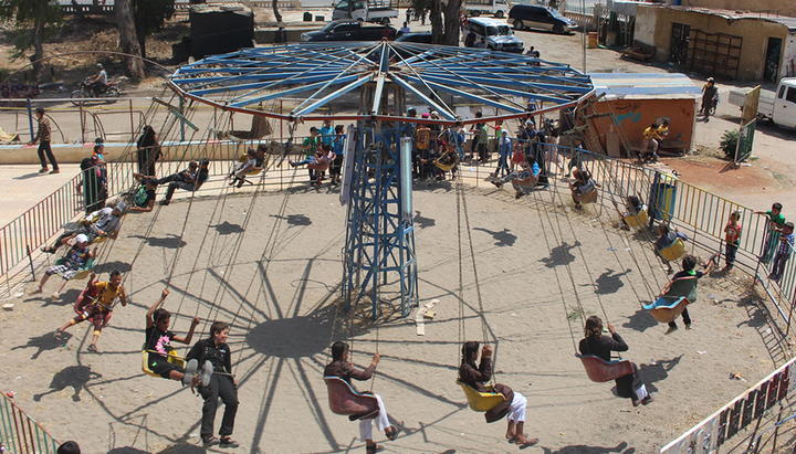 An Islamic State photo report claims to show children playing on Eid al-Fitr in Tabqa.