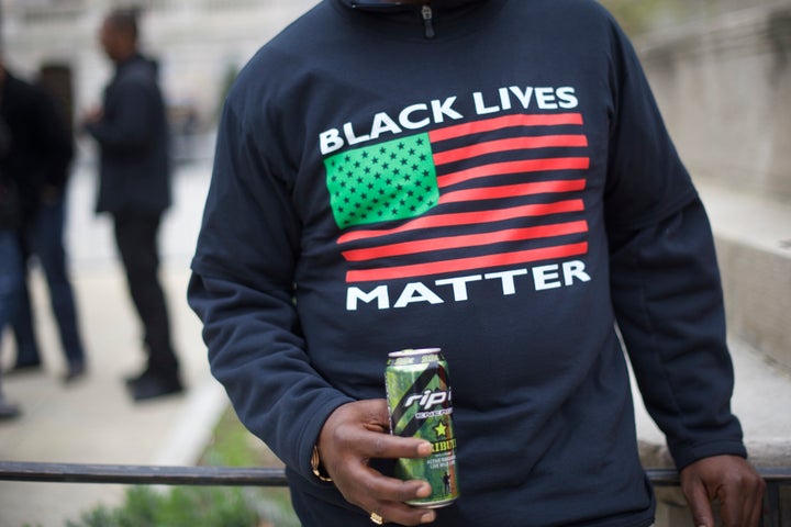 A Black Lives Matter protester outside of City Hall in Baltimore, Maryland, on April 25, 2015.