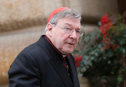 Australian Cardinal George Pell arrives for a meeting at the Synod Hall in the Vatican March 6, 2013. Catholic cardinals said