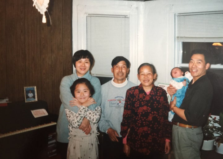 Li as a child with her parents, grandparents and younger brother, Jeffrey. 