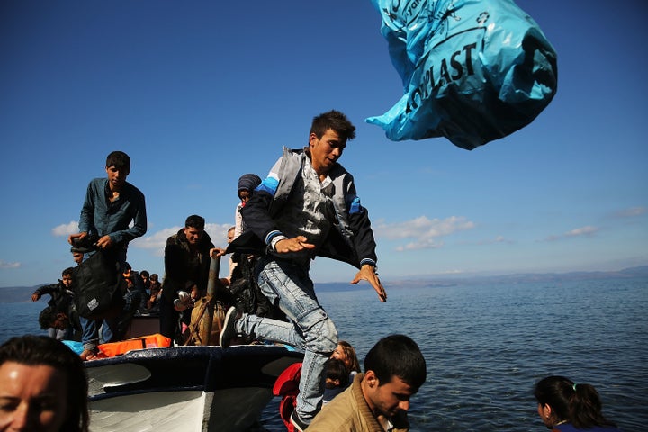 Syrian and Iraqi refugees arrive on the island of Lesbos, in Greece, on Oct. 13, 2015. Spain hasn't sold weapons to Syria since 2009, but overall weapons exports are increasing, and some could trickle into Syria anyway, experts say.