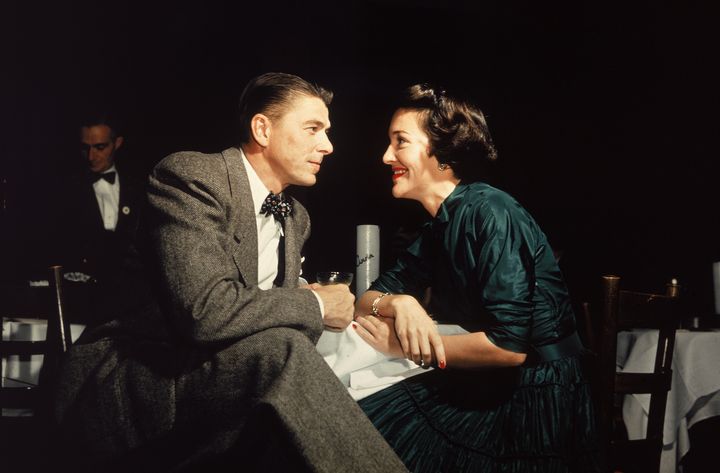 Ronald and Nancy Reagan gaze at one another across a table in 1952, the year they married in Los Angeles.
